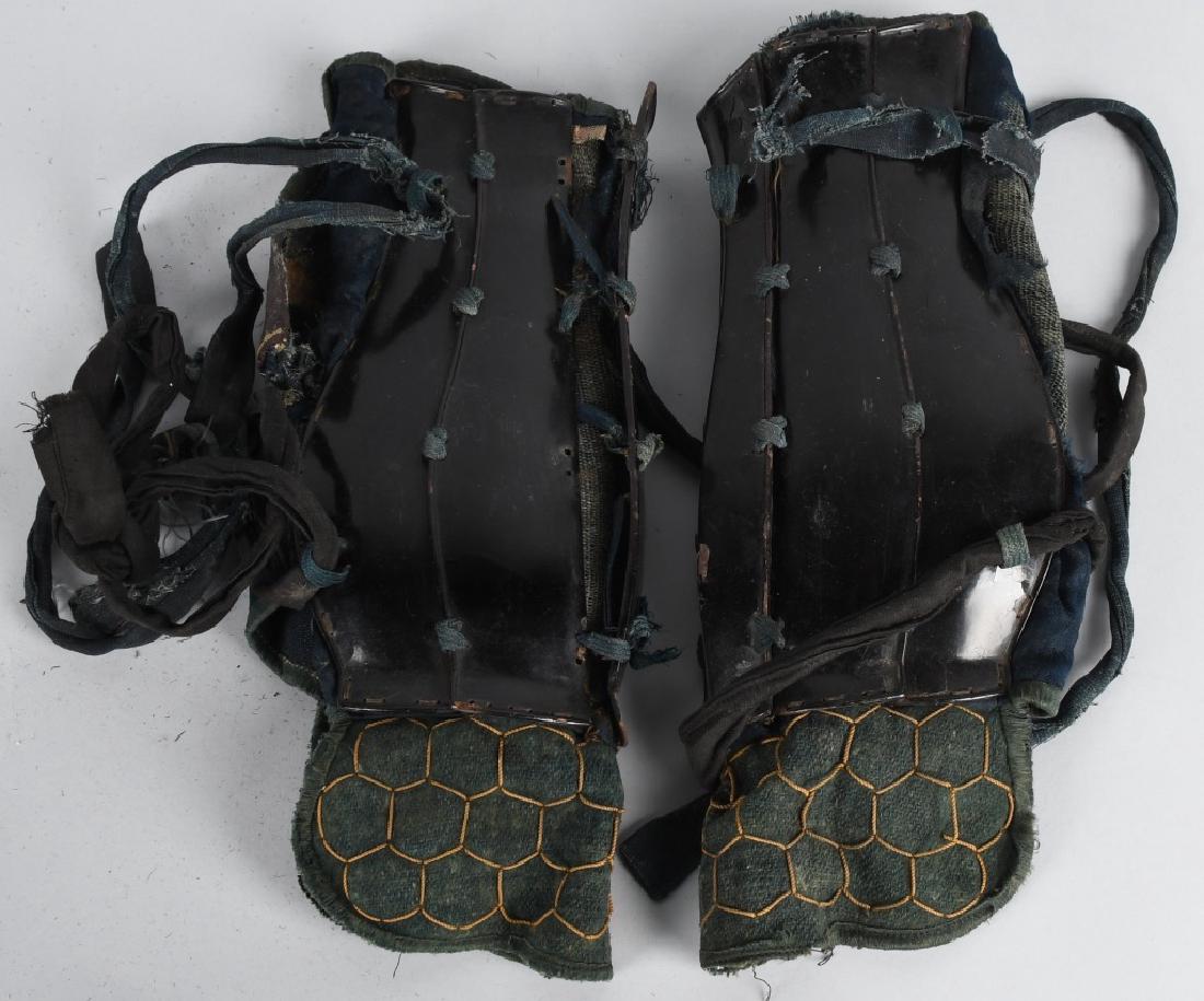 JAPAN EARLY ARMOR FOREARM GUARDS: Nice pair of early matching Japanese armor forearm guards. Both have overall wear but display nicely. Some lacing is loose. Good-Very Good