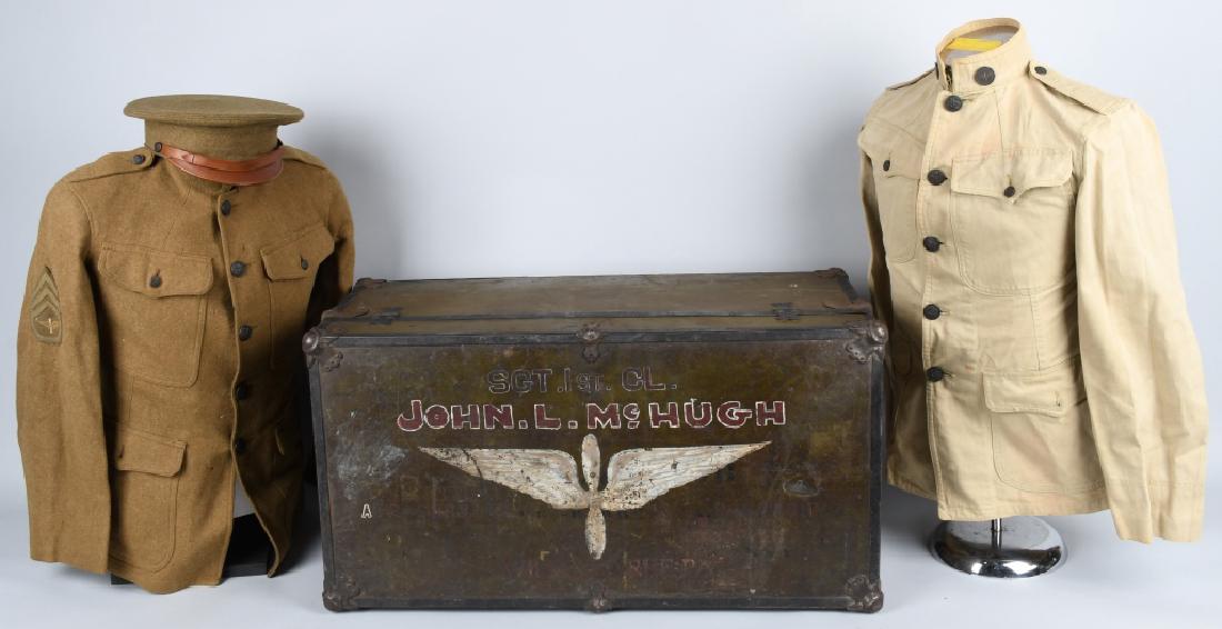 WWI U.S. ARMY AIR SERVICE PAINTED TRUNK & UNIFORMS: Beautifully painted World War One trunk featuring 19" painted air service wings under the ID, " Sgt. 1st Cl. John L. McHugh. Painted below McHugh's name but without the white outline paint making the 