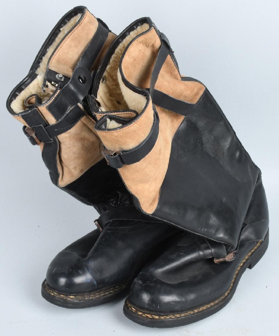WWII NAZI GERMAN LUFTWAFFE AIRCREW BOOTS: Near mint condition pair of Luftwaffe aircrew boots. The black leather sections are soft and supple, while the beige nubuck leg tops are near mint as are the soles and heels. The zippers are marked Zi