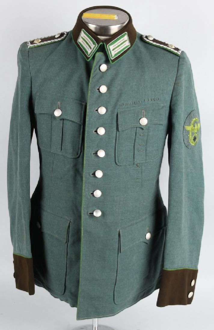 WWII NAZI GERMAN 8 BUTTON OFFICERS POLICE TUNIC: 8 button German police tunic with original insignia. Dated on the inside Po 1940 and Adolf Burger manufacturer marked. Front of tunic is near perfect while there are a few moth nips on the back. No we
