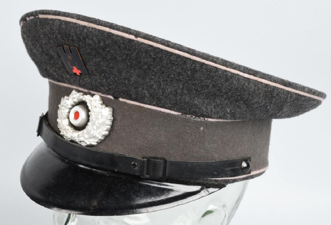WWII NAZI DRK GERMAN RED CROSS VISOR HAT: Original Nazi DRK "Duetsches Rotes Kreuz" German Red Cross Visor Hat. The DRK was instituted in 1864 and was a volunteer civil association. Came under control of the NSDAP in 1938. This scarce cap is