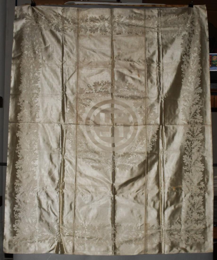 ADOLF HITLER'S TABLE CLOTH FROM MUNICH APARTMENT: Adolf Hitler's Table Cloth from his Munich residence Prinzregentenplatz 16/II. Very high quality Table Clothe with Swastika surrounded by Oak Leaves. Has some light wear and stains from use. Amazing p
