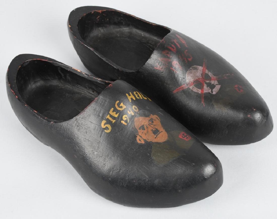 WWII ANTI HITLER TRENCH ART WOODEN SHOES: Very unique pair of Wooden Shoes. Trench art painted with portrait of Hitler say "Sieg Heil 1940" with Swastika on one shoe. Other show is painted with Skull with red X over it says "Kaput! 1945" with