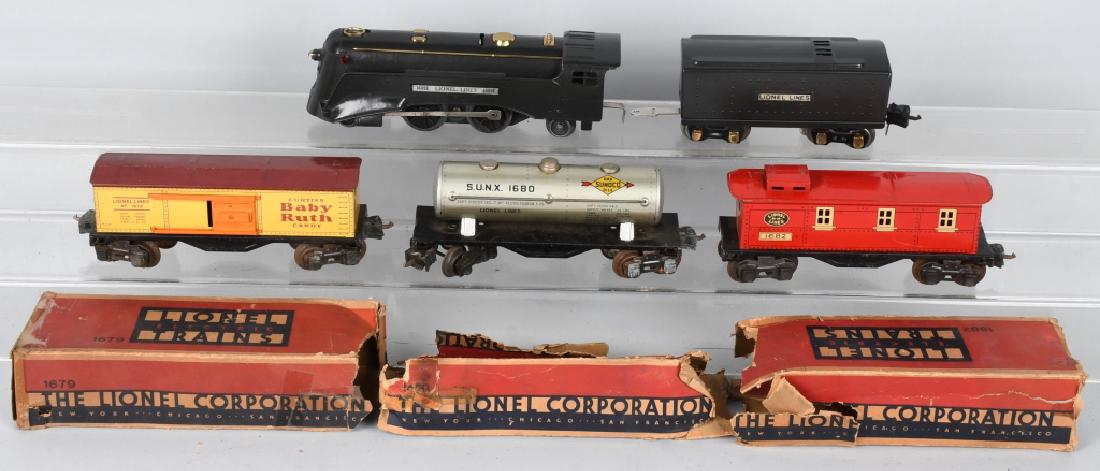LIONEL #1689E ENGINE & 3 FREIGHT CARS: Set includes Lionel #1689E Engine with Tender, #1680 Sunoco Tank Car, #1679 Baby Ruth Car, and #1682 Caboose. Some with Boxes. Excellent