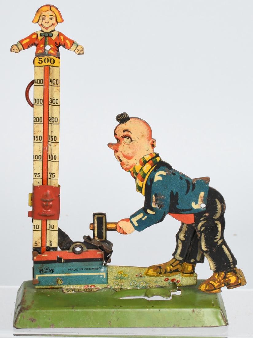 GERMAN 5c TOY CLOWN & STRENGTH TESTER (1 of 4)