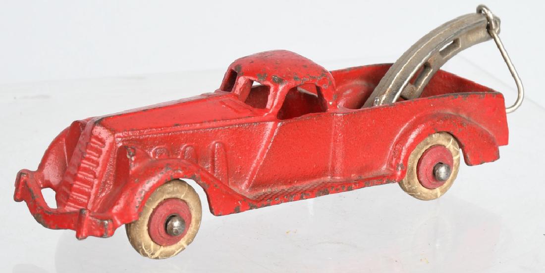 HUBELY Cast Iron WRECKER TOW TRUCK: All original with nice paint. Has nickel boom with hook. 6" Excellent