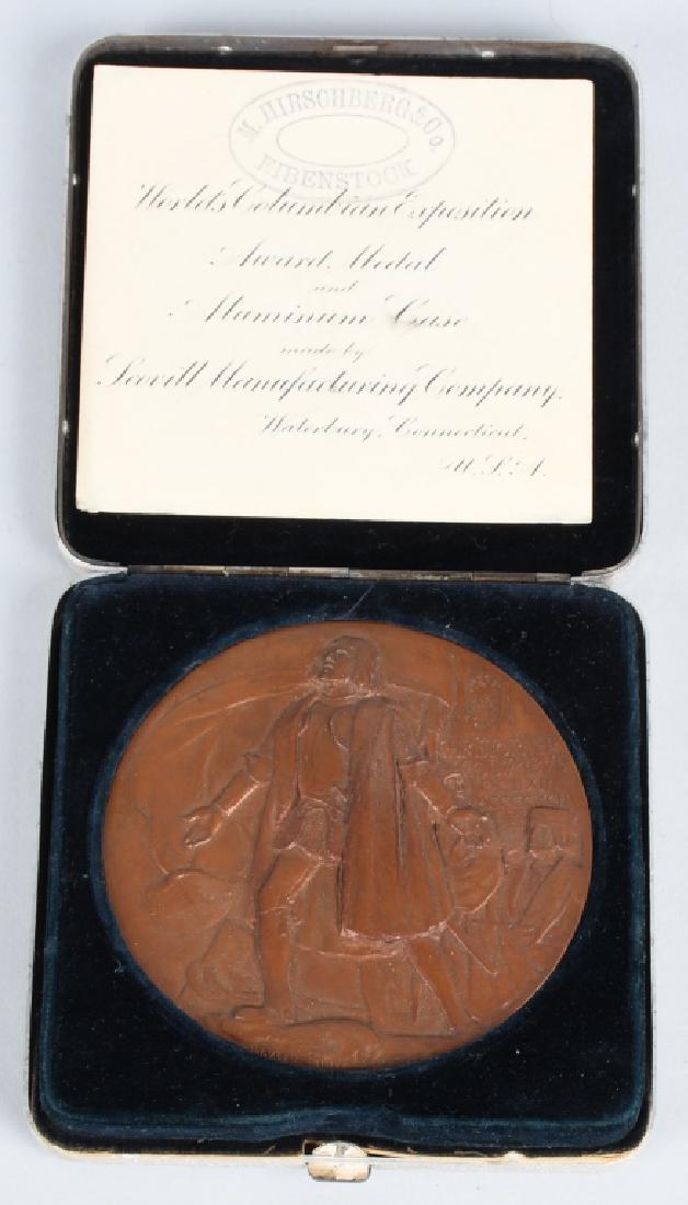 1893 COLUMBIAN EXPOSITION AWARD MEDAL: Excellent 1893 Official Columbian Award Medal. 76.3mm 3" medal. Bronze medal designed by Augustus Saint-Gaudens. Struck by Scovill Manufacturing Co. Waterbury CT. Beautiful mahogany color. Front full 