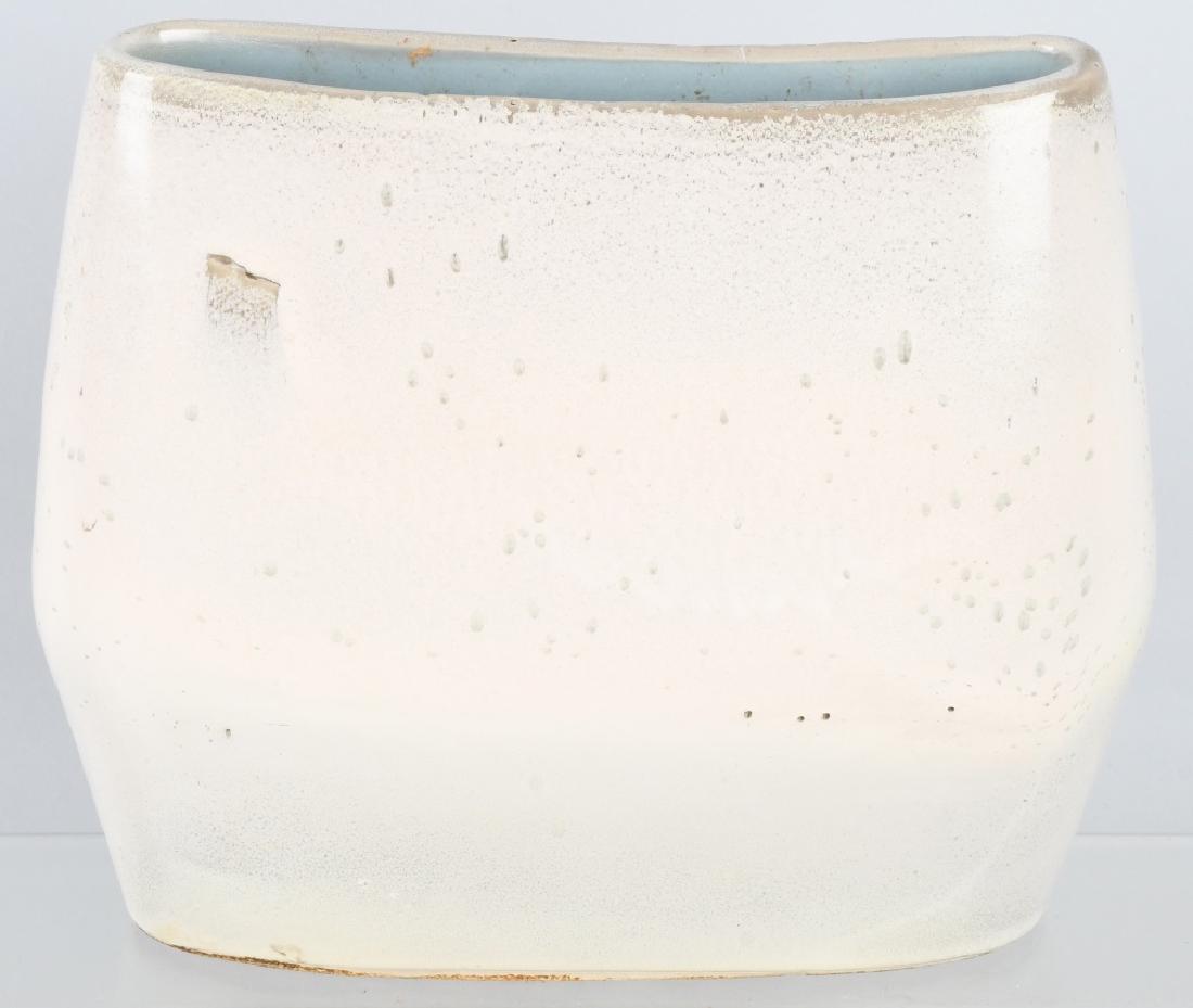 RUSSEL WRIGHT BAUER ART POTTERY VASE: Russel Wrights American Modern line of pottery was introduced in 1939. This cream color vase is 9 1/2" by 8 1/2" and is marked Russel Wright Bauer underneath. Excellent