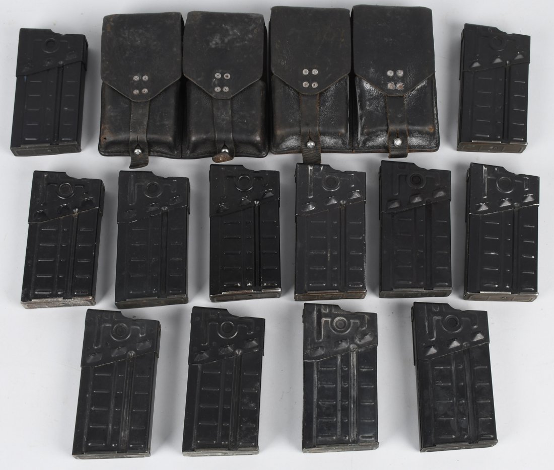16- H & K 91, .308 MAGAZINES, Heckler & Koch: Lot of 16 Heckler & Koch magazines for the Model 91 .308 rifle. Also included are 2 leather pouches which hold 2 magazines each. Very Good