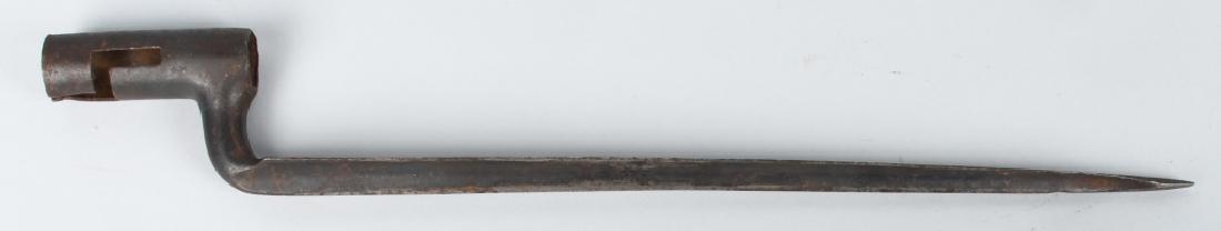 EARLY 19TH CENTURY U.S. MARKED SOCKET BAYONET: Large caliber early socket bayonet stamped U.S. at the elbow. Blade is 13.75". very good