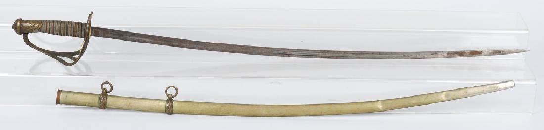 MODEL 1872 RIDABOCK N.Y., CAVALRY OFFICER'S SWORD: Model 1872 Cavalry Officer's sword, ,made in France and distributed by Ridabock & Co. New York. 39" overall with 33" blade. Brass hilt with ray skin grip and twisted brass wire. Blade is etched with f