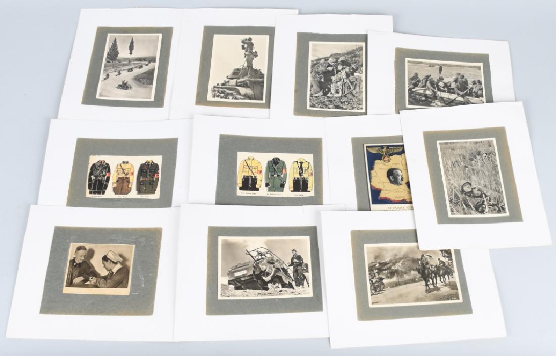 WWII NAZI GERMAN SOLDIER POSTCARD LOT: 2 German WWII Military Uniform Identification Post Cards. Also included is a Dictator Adolf Hitler post card. It reads '13 - Marz - 1938 Ein Volk Ein Reich Ein Fuhrer'. It shows a map of Czechoslovaki