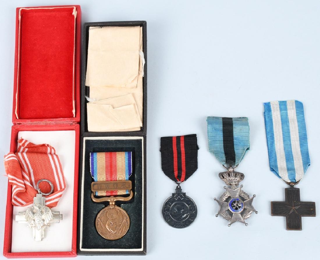 WWII MEDAL LOT GERMANY BELGIUM POLAND JAPAN ITALY: Four World War Two era medals incuding a German Finland Winter War medal 1939 - 40, A Second War Belgian Order of Leopold II; Knight for Combatant, A polish Lenino medal, and a 1937 Japan - China Inci