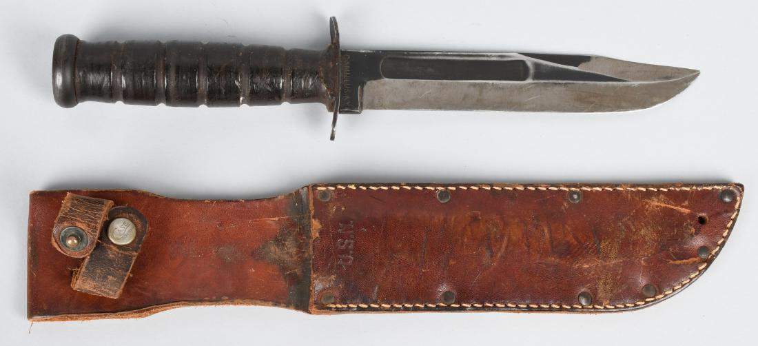 WWII USN CAMILLUS FIGHTING KNIFE, CASE SHEATH: Very nice ID'd Camillus NY Ka-Bar style fighting knife with Case USN leather sheath. The knife is 12" overall with a 6 3/4" blade that has been properly sharpened. The leather sheath is marked USN and