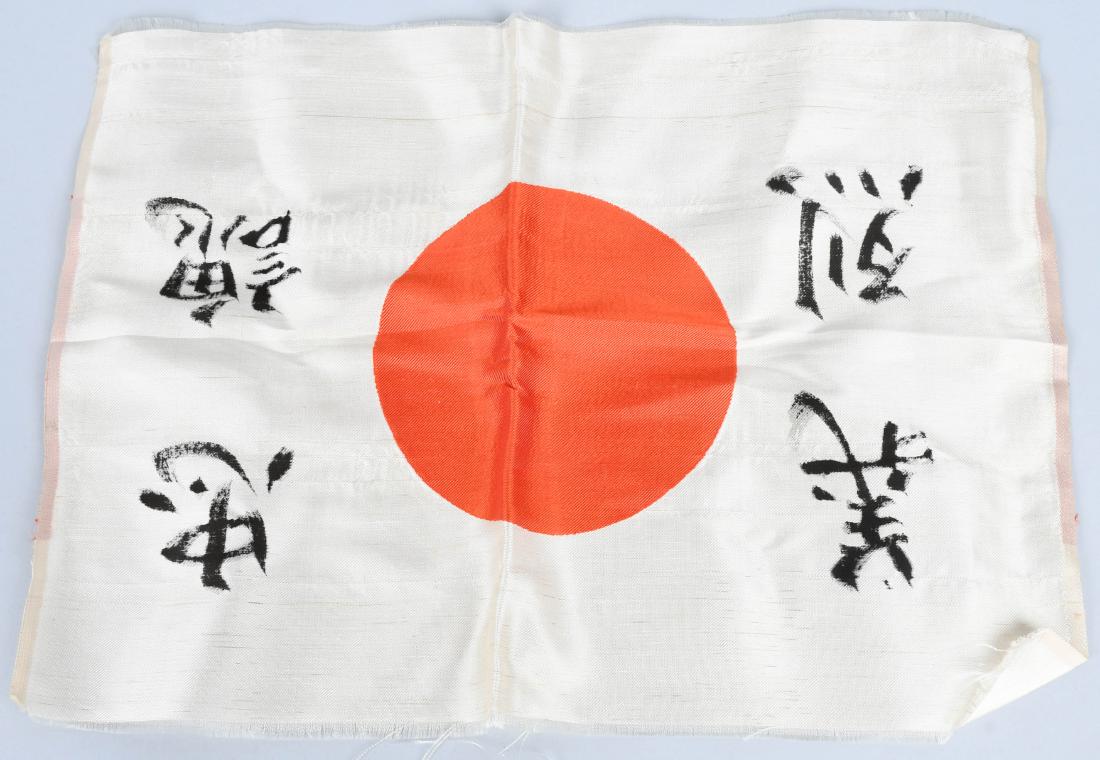 WWII SMALL JAPANESE FLAG WITH KANJI: Small silk flag with kanji. Flag is reinforced on two sides. Flag is 17.5" x 12.5" excellent.