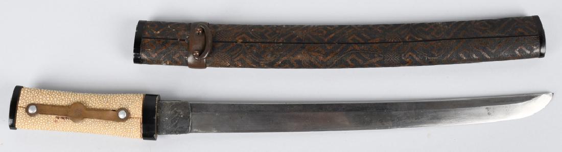 JAPANESE TANTO KNIFE & SAYA: 16" overall with 11 1/2" cutting edge. Blade has straight temper, and unsigned tang. 2 piece habacki is split at base. Blade has rubs and scratches, and evidence of sharpening. Ray skin type grip. Goo