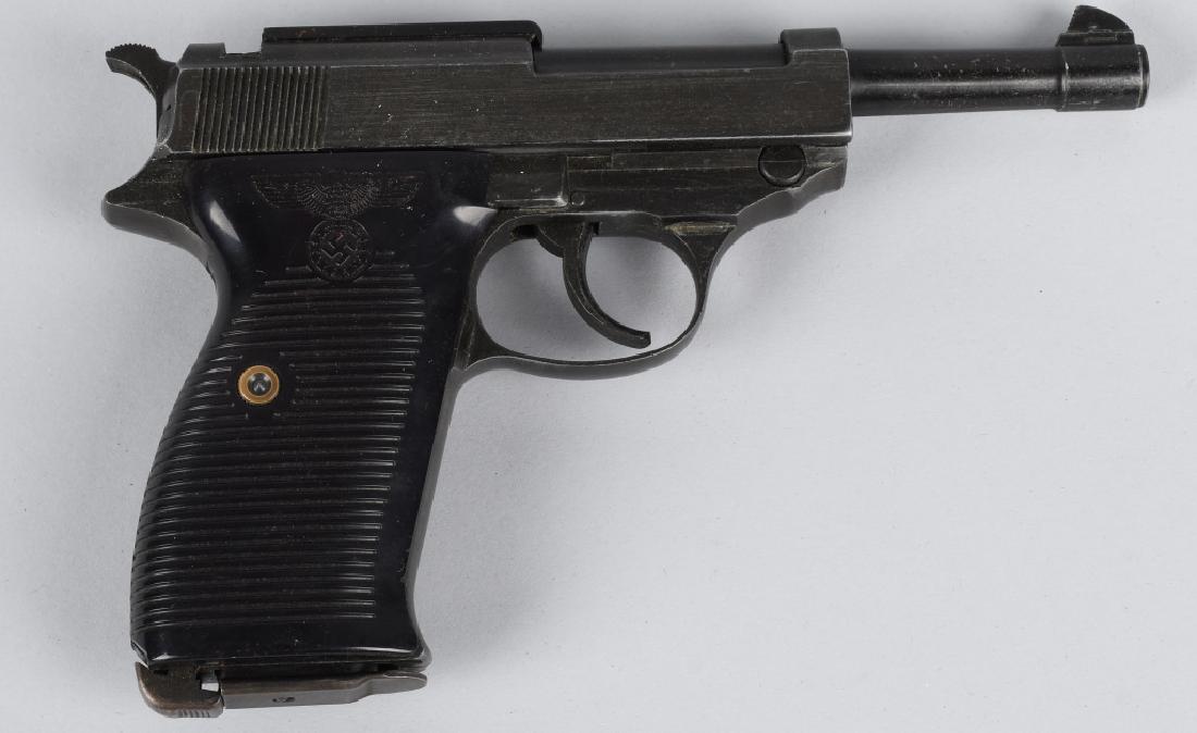 P-38 PROP PISTOL, INERT NAZI: Nicely made prop pistol, almost an exact duplicate of a P-38 German pistol. Inert , cannot be made to fire. Excellent
