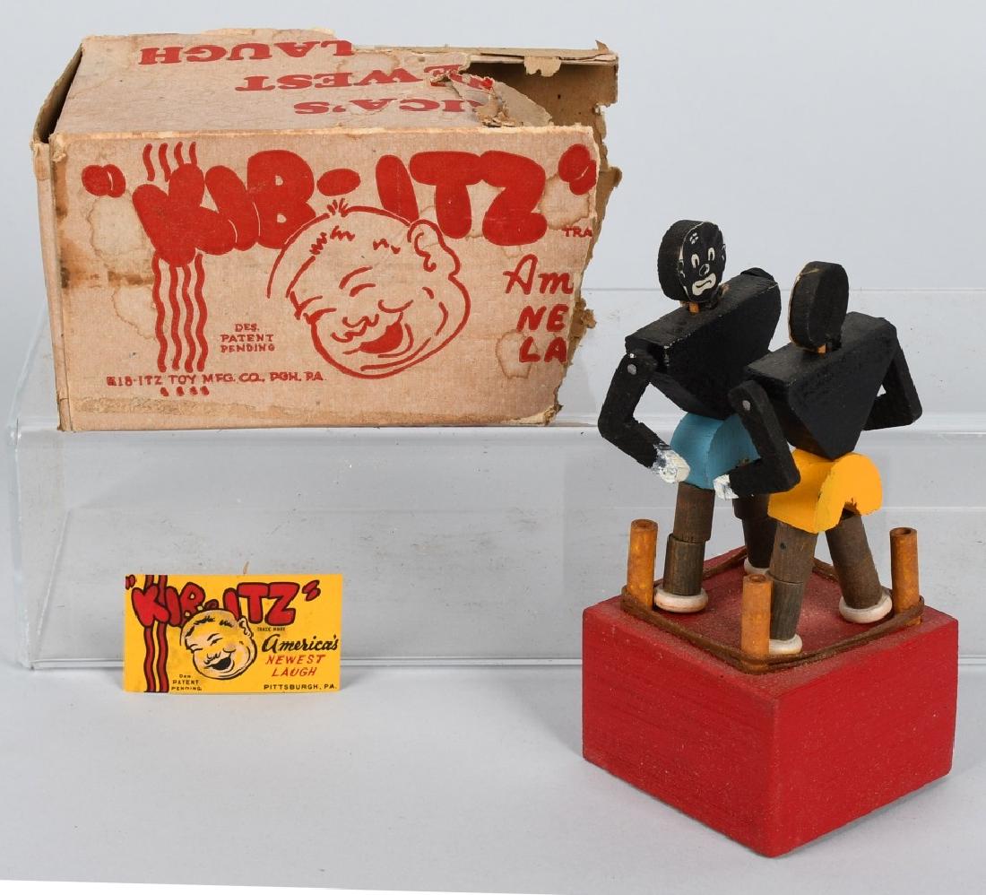 KIB-ITZ BLACK BOXERS TOY w/ BOX: Wooden Black Boxers squeeze toy. All original and works. Partial Box. 5 1/2" Excellent