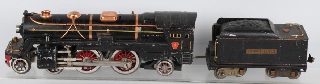 LIONEL STANDARD GA 392E ENGINE & 390T TENDER: Lionel Standard Gauge #392E Engine and #390T Tender. Engine has chugger unit. Wheels are original. Tender has orange stripe. Both have normal wear. Very Good