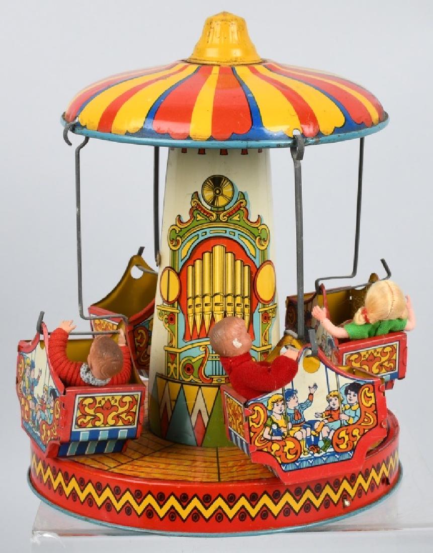 CHEIN tin windup AERO SWING CARNIVAL TOY