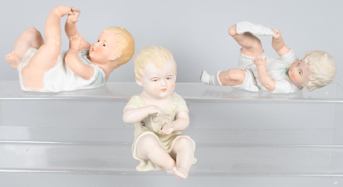 3-HUEBACH BISQUE PIANO BABIES (1 of 8)