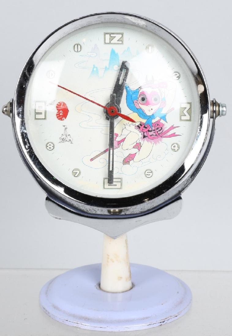 SUPER HERO ALARM CLOCK w/ MOVING EYES: Unusual Superhero Alarm Clock. Great image with moving eyes. Works. 6" Excellent