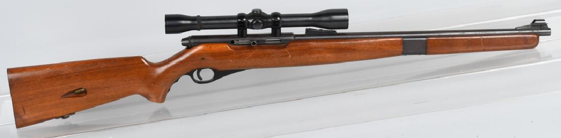 MOSSBERG MODEL 151M .22 SEMI-AUTO RIFLE: Model 151M, 20" barrel with excellent bore. .22 caliber long rifle. Blue finish in protected areas, mostly turning plum brown. Very good wood stock. Action works well. Includes Sears 6x scope. Very Go