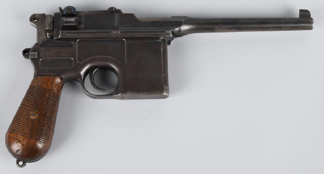 GERMAN MAUSER C96 7.63mm SEMI AUTO PISTOL: SN 205073, German Mauser C96 also known as "The Broom Handle Mauser". 5 1/2" barrel with very good-excellent bore. Smooth metal with nice markings and traces of finish. Very good wood grips. Action wo
