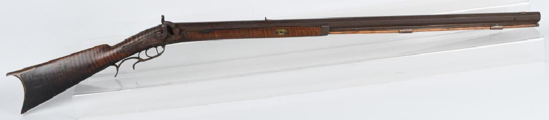 19th CENT. HEFNER .40 MUZZLELOADING RIFLE: Rifle has 36 1/4" octagon .40 caliber barrel. Has the maker name "Hefner" on top barrel flat. Has working engraved back action lock. Works well with set trigger. Tiger maple half stock has 2 old brass