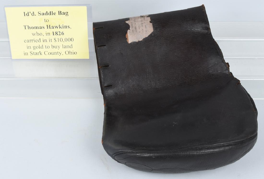 1826 IDENTIFIED SADDLEBAGS CARRIED GOLD TO OHIO: Early 19th century saddlebags with old tag affixed that reads, "In this saddle bag Thomas Hawkins carried (1826) ten thousand dollars on horseback from the Farmers National Bank of Pittsburgh Pa. in g