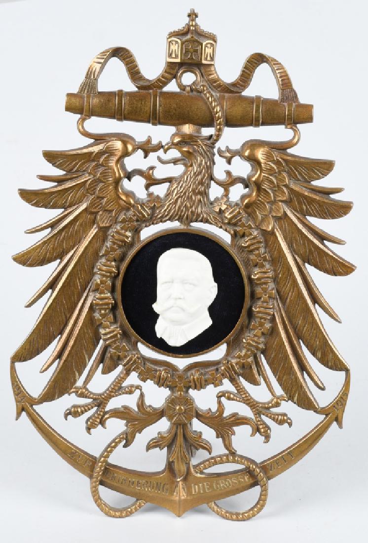 WWI 1914-15 GERMAN WILHELM II PLAQUE MADE IN U.S: World War One Kaiser Wilhelm II table plaque made in the United States with a back stand to display upright. the bottom obverse reads "Zur Erinnerung in Die Grosser Zeit " - (A reminder of the great t