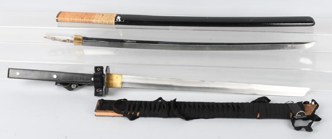 2-KATANA SWORDS: Pair of contemporary Katana type swords with sayas. Largest is 31" with a 26 3/4" cutting edge. The blade has an active homon. It is missing the grip. Both are Very Good-Excellent