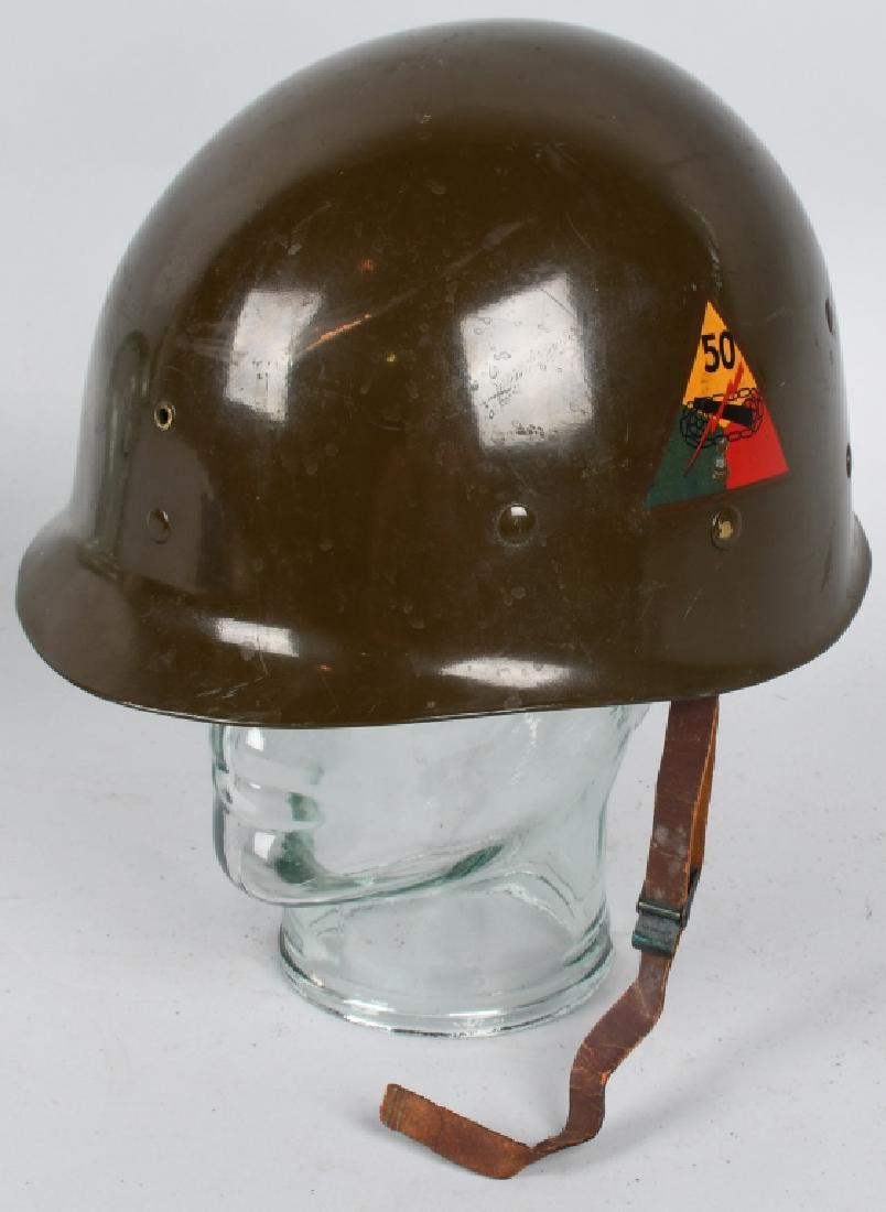 WWII WESTINGHOUSE HELMET LINER - IDED: World War Two Westinghouse liner for the M1 helmet with two 50th Armored Division decals. On the webbing is written the name " Seiler " and " 6594 ". Excellent.