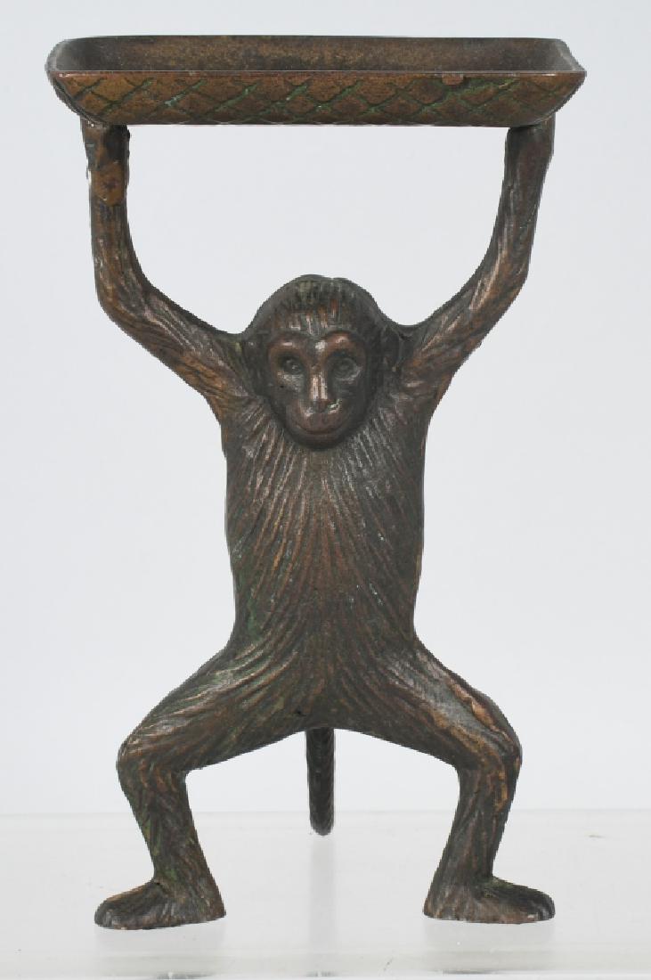 BRONZE MONKEY & TRAY BUSINESS CARD HOLDER: Nice vintage cast bronze of a standing Monkey holding a tray above his head. The tray is a perfect size for business cards. No makers mark. 7" high, Excellent