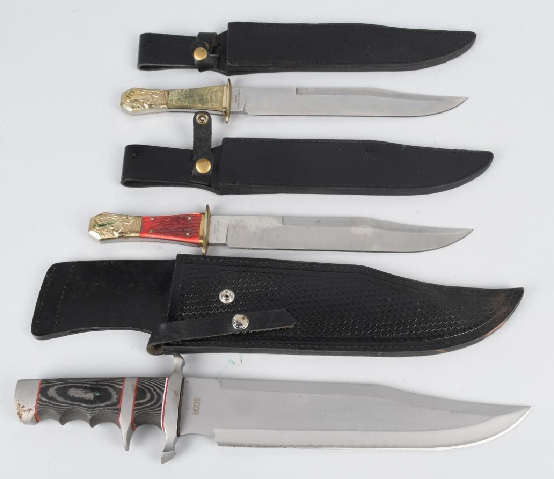 3-SCHRADE BOWIE KNIVES & LEATHER SHEATHES: Nice grouping of contemporary Schrade knives each with a leather sheath. Largest is the Schrade extreme survival knife at 17 3/4". The other are Shrade Customs and are maker marked Stewart, Taylor & S