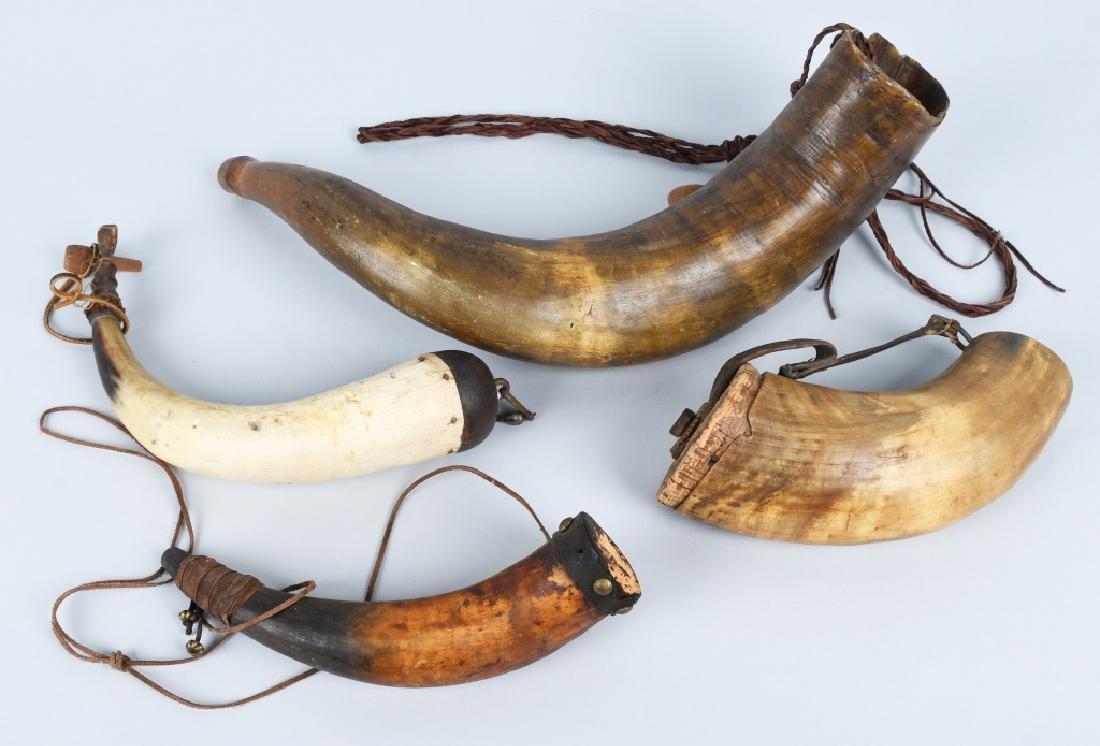 4- ANTIQUE POWDER HORNS: Includes 18" curved Horn, 11" Horn complete with some very worn scrimshaw work, 11" Horn complete, and 10" Horn complete with leather and studs. Very Good-Excellent