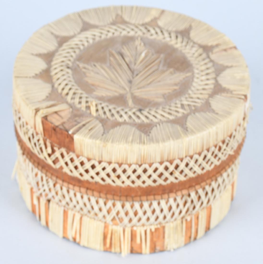 IROQUOIS QUILLED BASKET w/ LID: Great round shaped lidded birch bark trinket basket covered completely in plain porcupine quills with a maple leaf on the lid . 6" diameter by 3 3/4" deep. Some quill loss, but displays well overall.