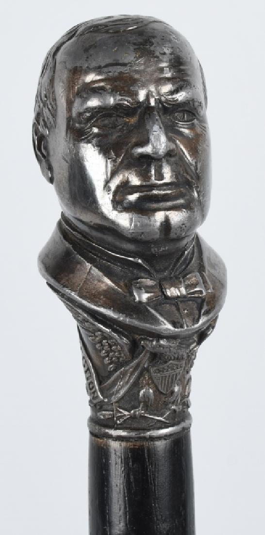 1896 WILLIAM McKINLEY CAMPAIGN FIGUARAL CANE: Excellent 1896 William McKinley Campaign Figural Cane. Great bust of McKinley with Eagle with Shield. Dated '97. All original and in wonderful; condition. 36" Excellent