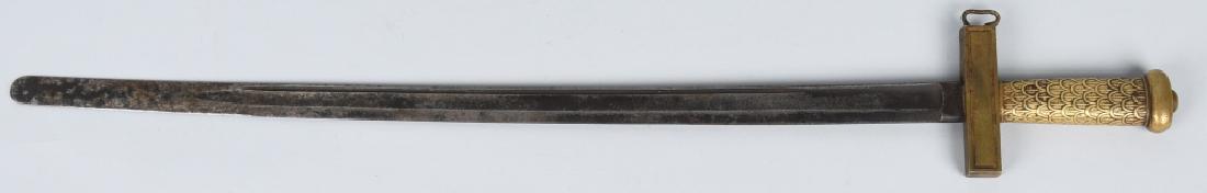 19th CENT. BRASS HILT SHORT SWORD: Sword has been made from a blunted Civil War era cavalry sword blade and a cast brass hilt. 3 1/2" overall with a 26" blunted blade that is 1 18" wide. The grip has cast in fish scales, and the cross 