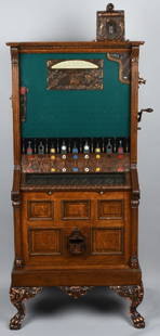 5c CAILLE BULLFROG SLOT MACHINE: Great looking upright slot machine. Very nice wood case with very ornate metal casting. Front has casting with 2 Bullfrogs. Legs are cast with Angels. This is a very beautiful ornate machine. The mach