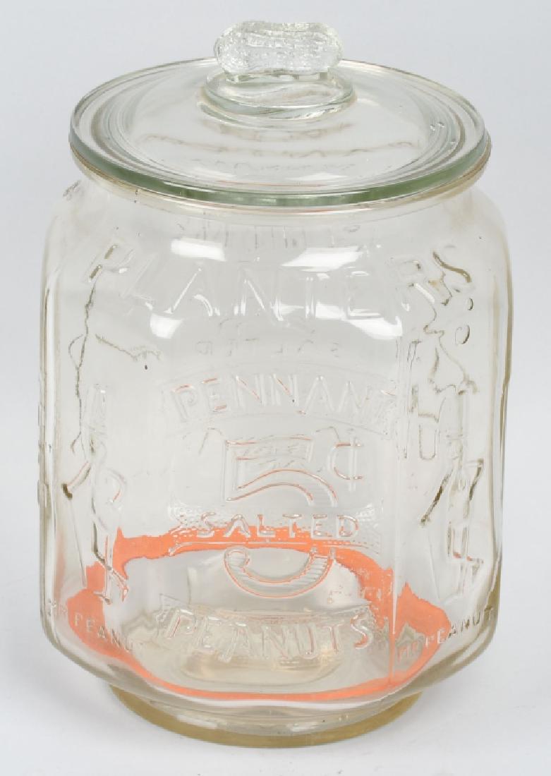 PLANTERS PEANUT 5c OCTAGON STORE DISPLAY JAR: Nice early Octagon 5c Planters Peanut Store Display Jar. Embossed with Mr Peanut and 5c. Has original lid. 13" Excellent