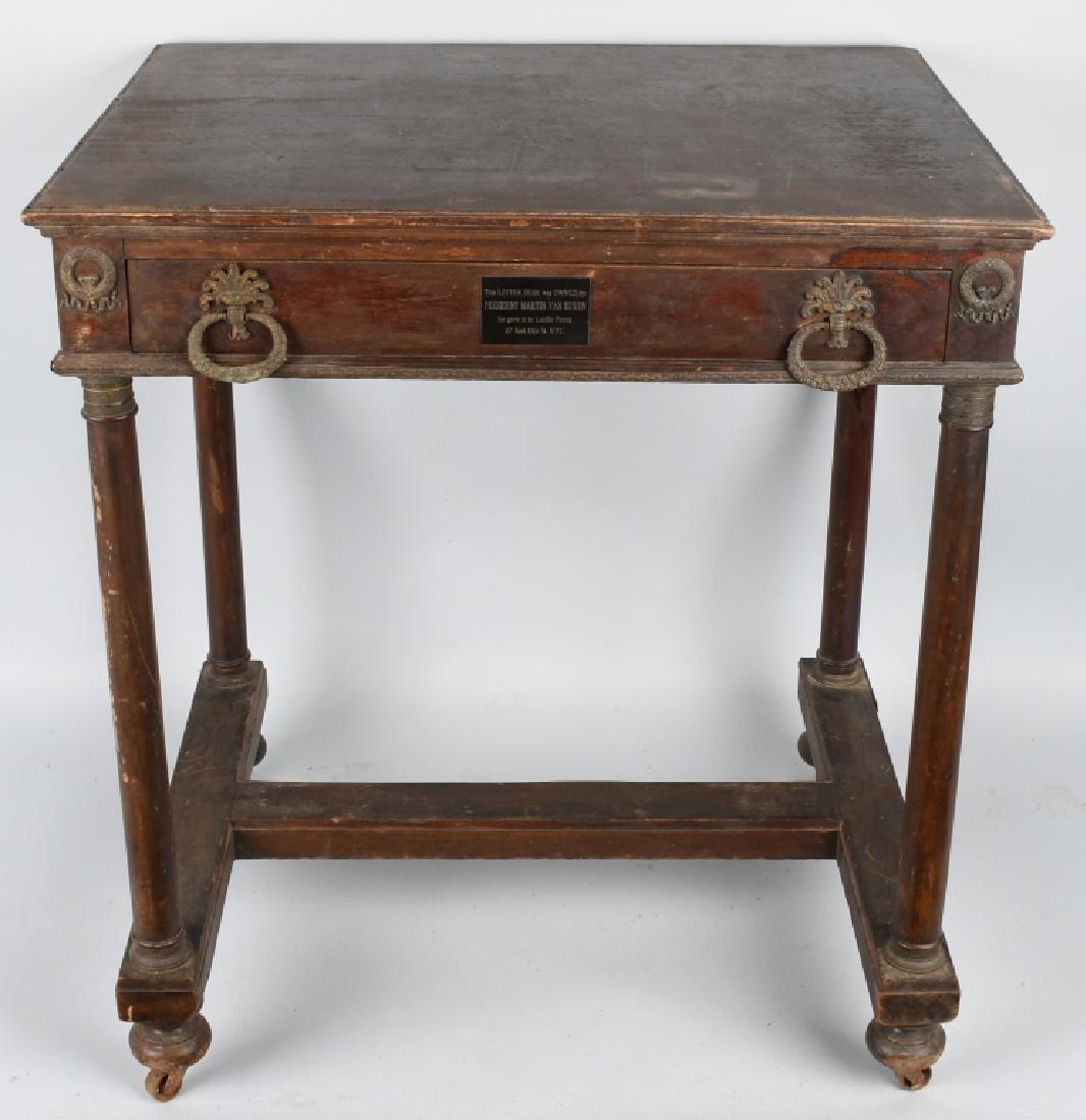 MARTIN VAN BUREN DESK: Desk measures 31" by 28" by 22", and single drawer and turned legs on a frame. The pulls and accents are brass. Has a plaque on the drawer indicating that it was a gift from Martin Van Buren. The desk