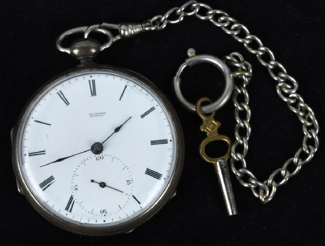 JOS JOHNSON LIVERPOOL KEY WIND SILVER POCKET WATCH: 48mm Silver Cased Antique Men's Pocket Watch in excellent working order. Has Nice Engraving of a Rowboat in Front of a Castle. Includes chain, Watch dome with wooden base and a Key. Excellent