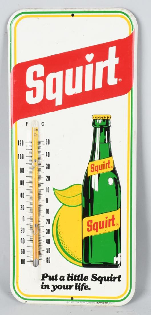 SQUIRT TIN EMBOSSED THERMOMETER (1 of 3)