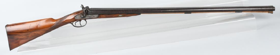 ANTIQUE W. RICHARDS SxS PERCUSSION SHOTGUN: 36" muzzle loading Damascus barrels. Very good checkered wood stock with minor wear and a splinter missing on the right forestock. Lock action is crisp and both lock plates are marked W. Richards. Ant