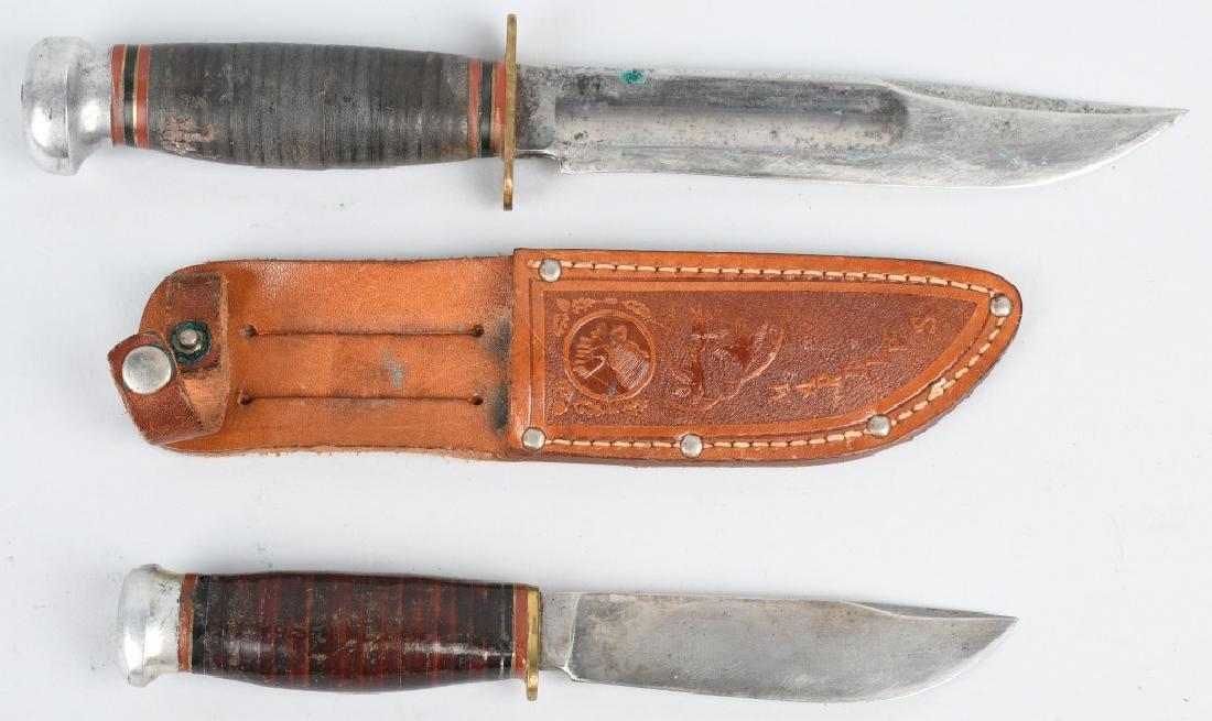2- MARBLES KNIVES HUNTER & PREWAR SPORTS: To Include a 10" Hunter and a 7" prewar sports knife with leather sheath. Hunter shows wear and Sports is Excellent