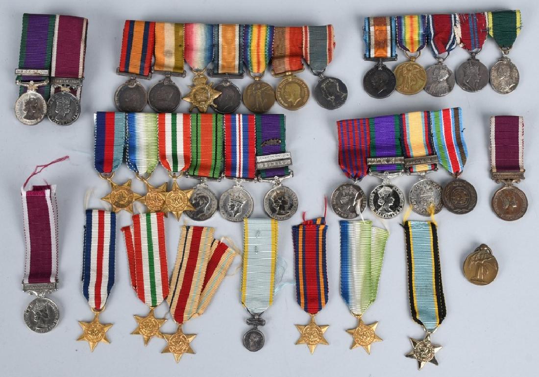 WWI - WWII BRITISH MINIATURE MEDAL BARS & MEDALS: 5 British mini medal bars and 9 loose miniature medals. Bars and medals range from World War One through World war Two and post WWII. very good - excellent.
