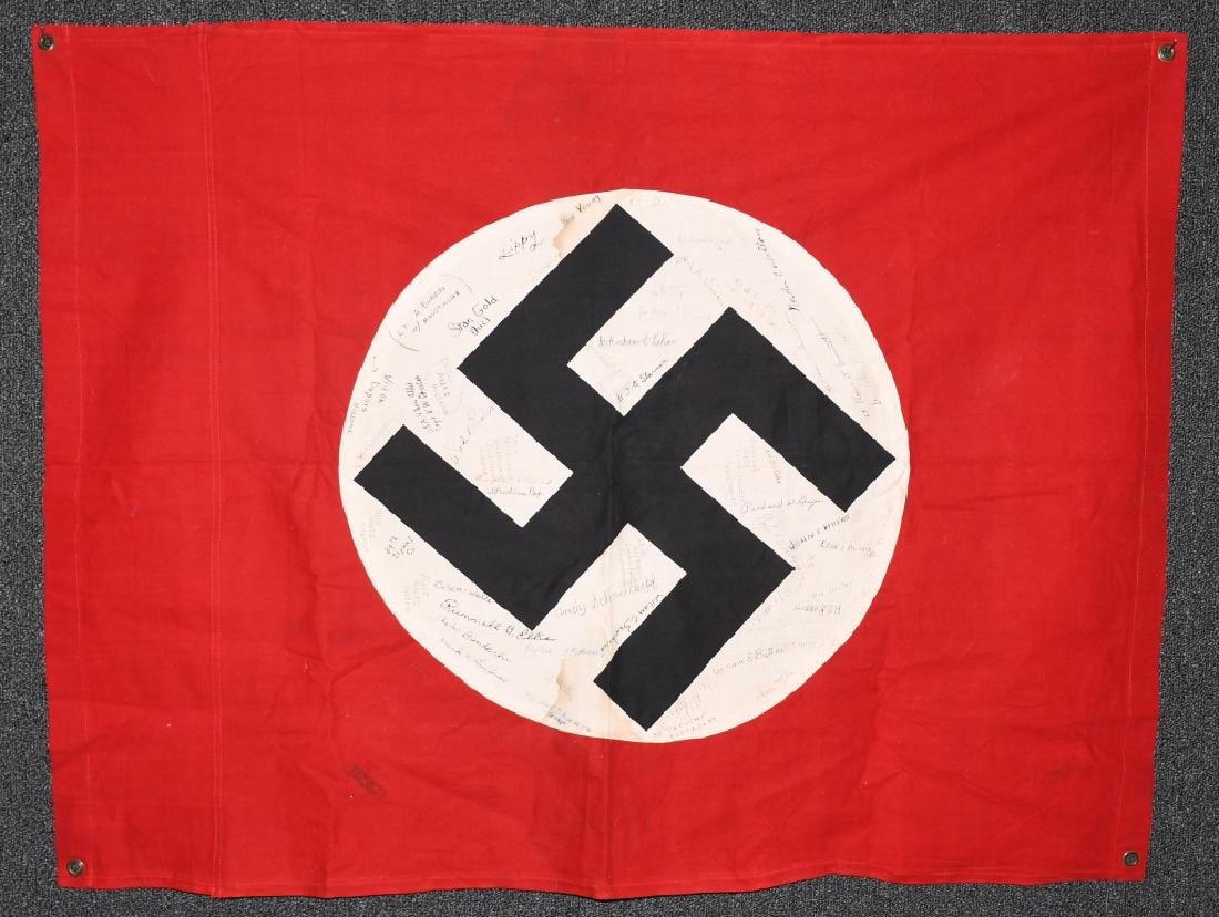 WWII NAZI VEHICLE ID FLAG GI SIGNED 84 SIGNAL CO.: Nazi German vehicle Identification flag captured by the 84th Signal Company in Holland and signed by soldiers and Dutch citizens. One GI even signed "A Hitler 45" as a joke. All grommets are intact. O
