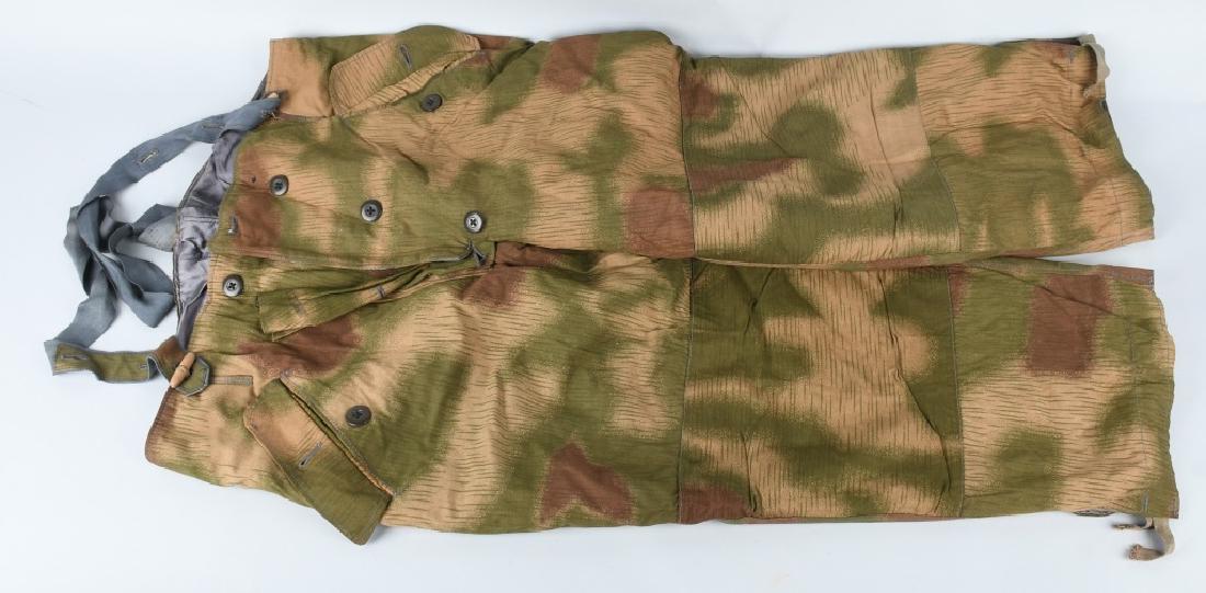 WWII NAZI GERMAN SWAMP MARSH CAMO TROUSERS & SUSP.: WWII Nazi German swamp marsh tan water pattern camouflage winter trousers with suspenders. Water repellant, cotton/rayon bleousernd construction, trousers with the machine roller printed, softly blurr