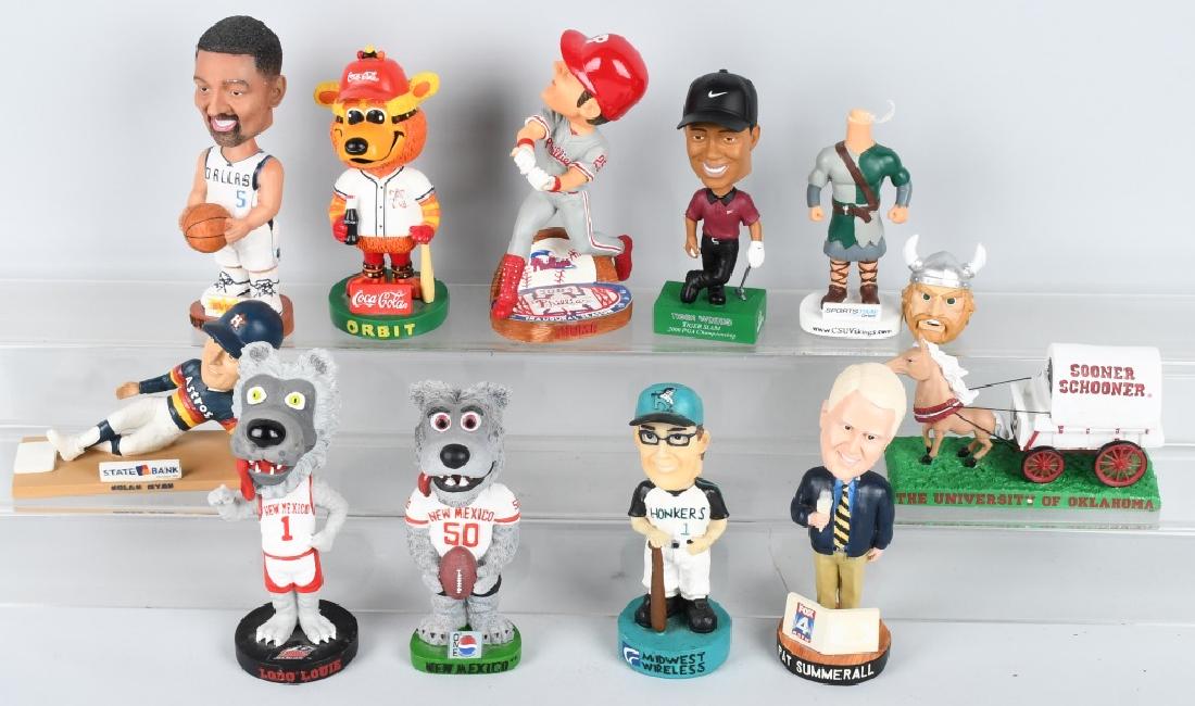 11- BOBBLE HEADS: Includes SCU Vikings, OU Schooners, Orbit, Juwan Howard, New Mexico, Tiger Woods, and More.